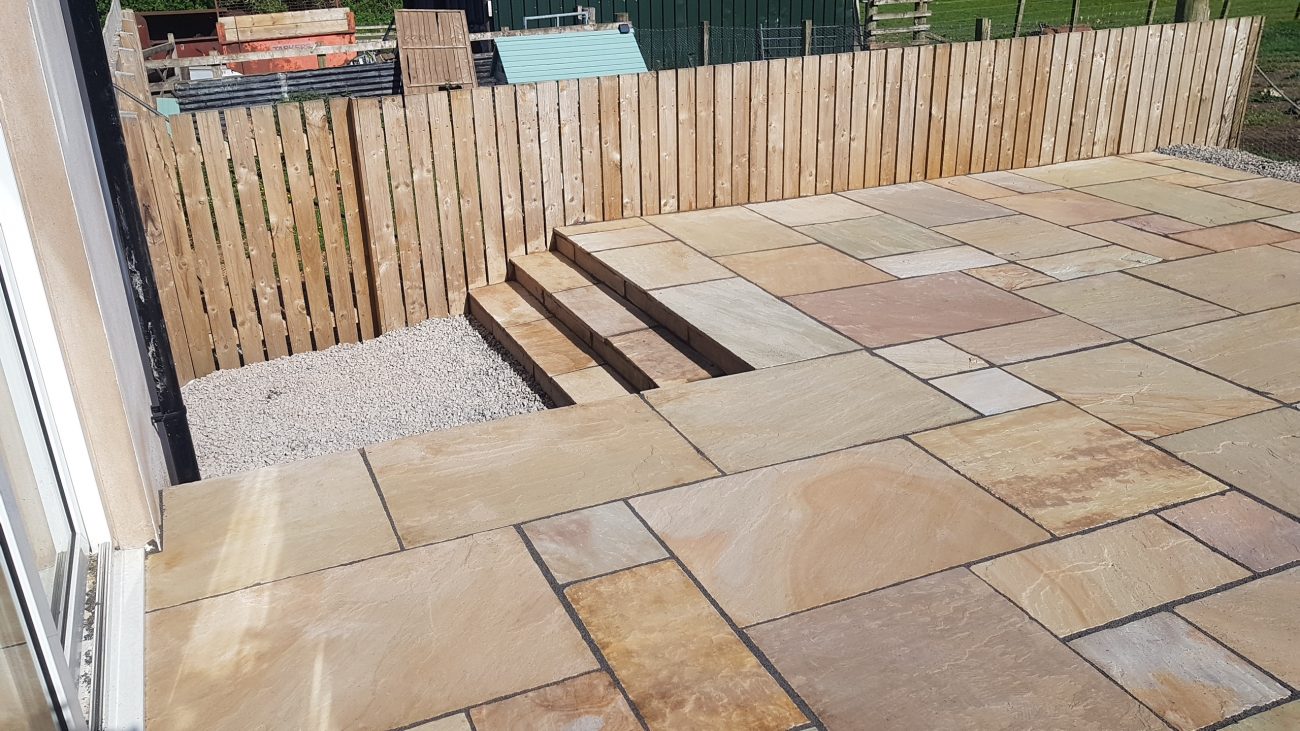 indian sandstone patio with corner steps