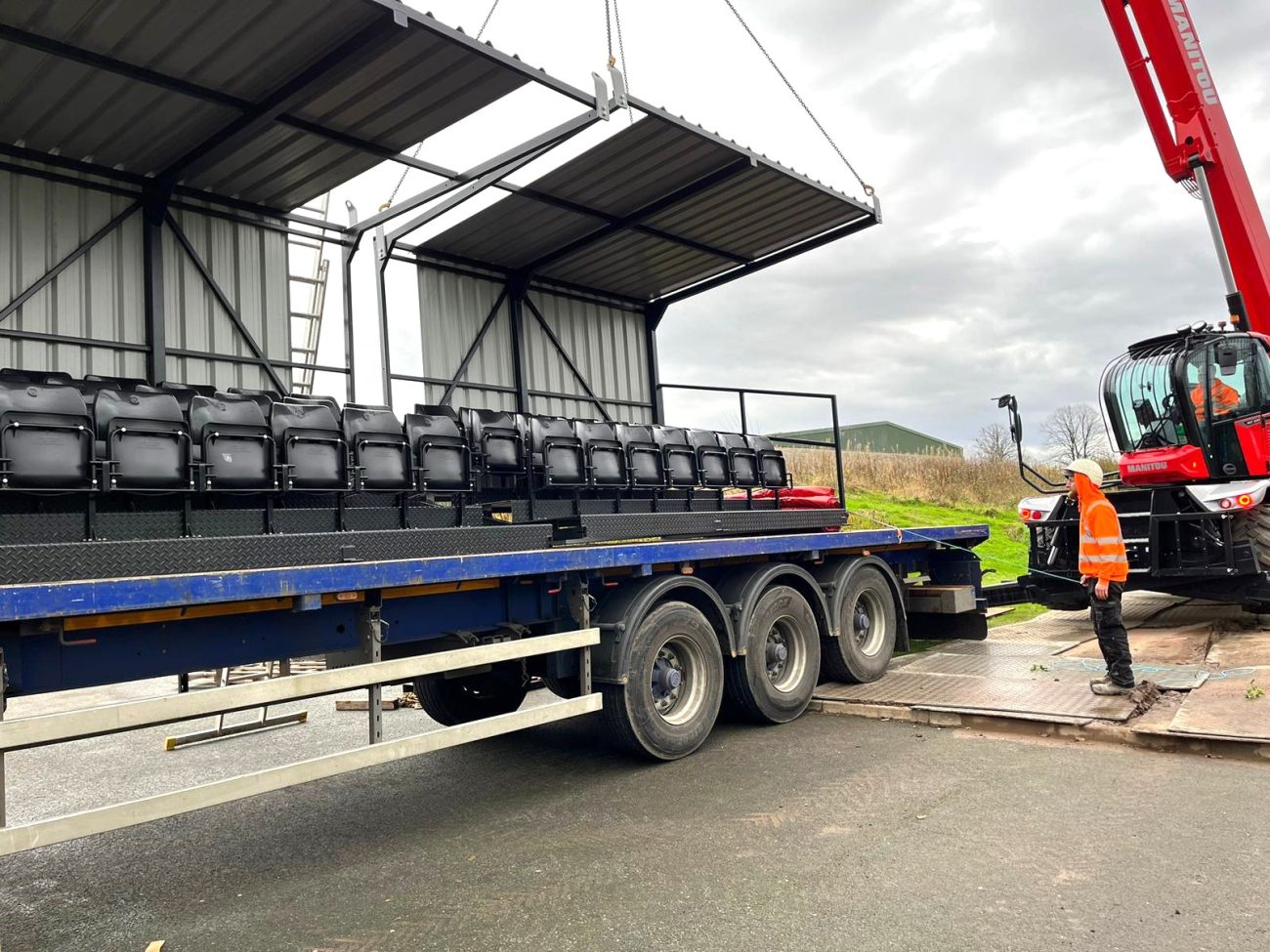 crane delivery of grandstand seats