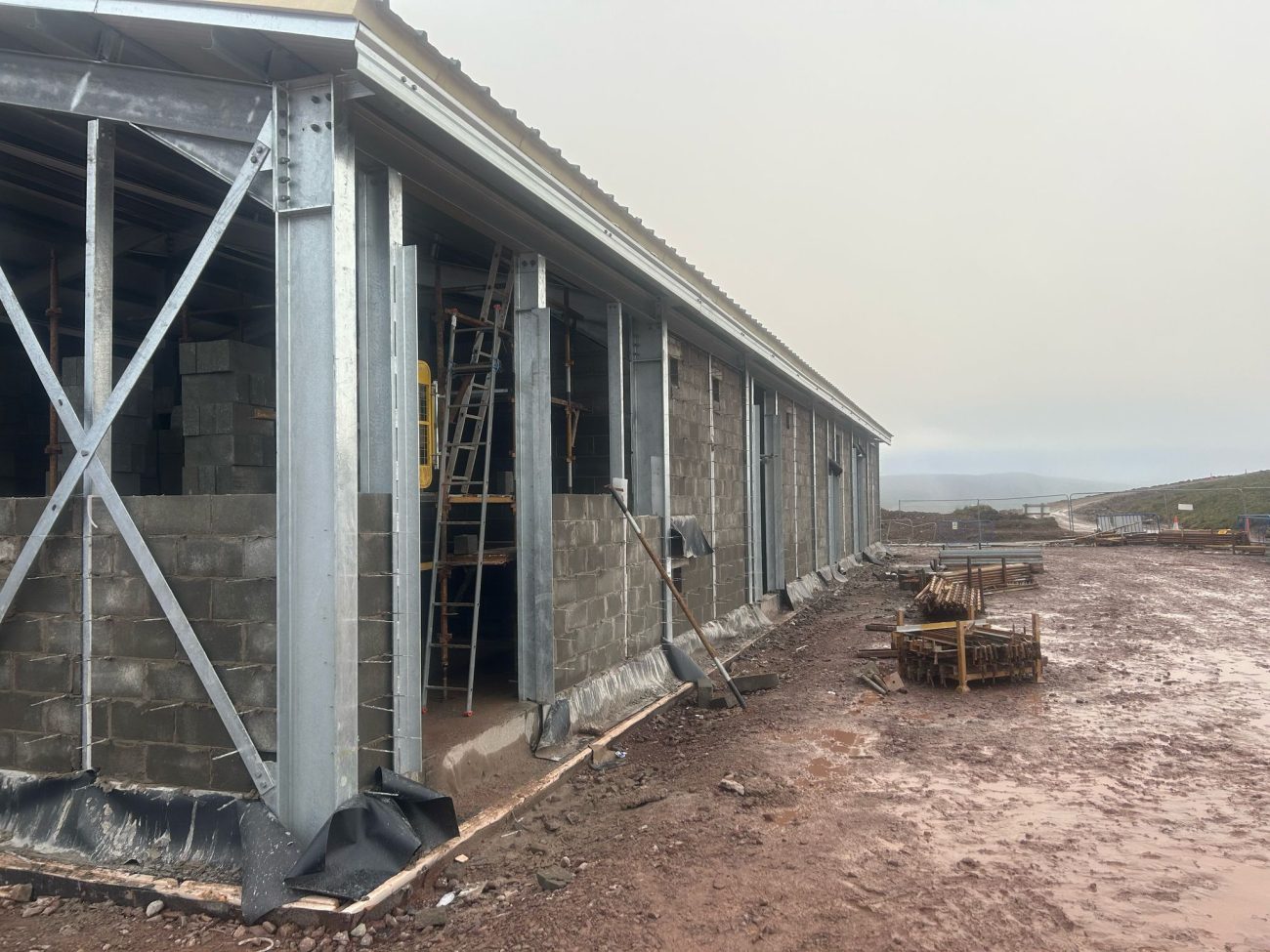 Structural steel frame and blockwork cavity walls taking shape during construction of the new control building at Hagshaw Hill Windfarm.